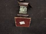 a small clock that is sitting on a table