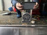 a man taking a picture of himself with his cell phone