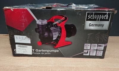 the box is open to show the contents of a small pump