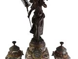 an image of a statue of a woman holding a broom and a clock