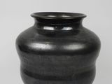black vase on a white background with a white background