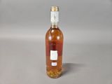 a bottle of wine that is sitting on a table
