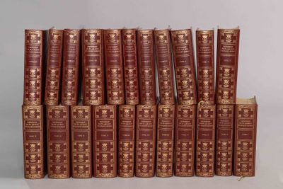 several books stacked on top of each other on a table