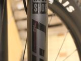 a close up of a bike with a sticker on it