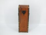 an old wooden box with a black handle on a white background
