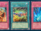 three cards with different colors and designs are shown in this image