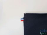 a black pouch with a blue and white stripe on it