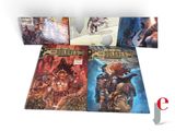 the complete set of four comics are on display in a display case