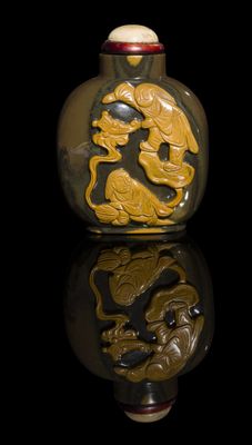 chinese snuff bottle decorated with a dragon and a fish