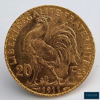 une image montrant un gros plan d'une pièce de monnaie sur laquelle figure un coq
