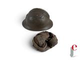 a helmet and a nut shell on a white surface