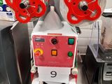 a machine that is sitting on a counter in a kitchen