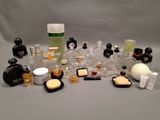 a lot of perfume bottles that are sitting on a table