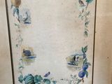 framed picture of a picture of a bird and flowers in a frame