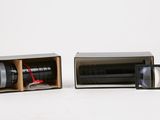 a small box that has a flashlight inside of it