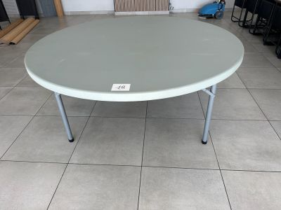 a table that has a price tag on it in a room