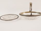 an image of a silver plate with a spoon and a bowl
