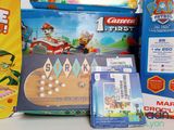 many toys and games on the table for children to play