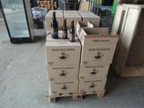 boxes of wine are stacked on top of each other in a warehouse