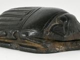 an image of a statue of a beetle on a white background