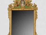 un miroir sur lequel figure l'image d'une femme