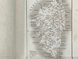 an open book with a map of ireland in the middle of it