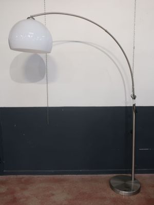 an image of a lamp that is on a stand in a room