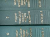 three books that are stacked on top of each other