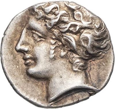 a silver coin with an image of a man ' s head on it