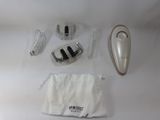 a white bag with a white cord and a white device on it