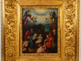 tableau représentant la Nativité de Jésus dans un cadre doré