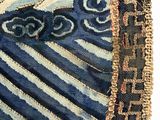 a close up of a piece of cloth with a design on it