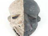 an image of a black and white mask on a white background