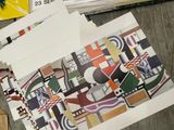 a picture of a bunch of papers that are on a table