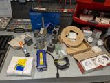 a table with a lot of tools on top of it