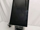 an image of a monitor on a stand on a white background