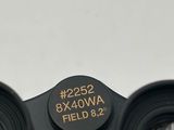 a close up of a pair of binoculars with numbers on them