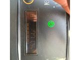 a close up of a person ' s finger pressing a button on a toaster