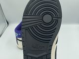 a close up of a pair of shoes on a white surface