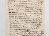 a handwritten letter written in black ink on a piece of paper