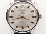 an image of a longines watch with a silver dial and black leather strap