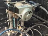 a car that has a bunch of wires in the back of it