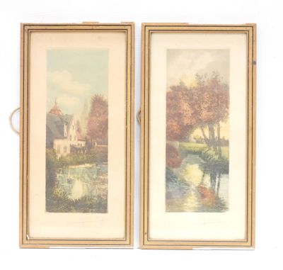 two framed pictures of a house and a river with trees