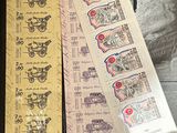 three different stamps on the same sheet of paper