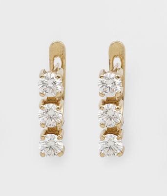 a pair of diamond earrings on a white background