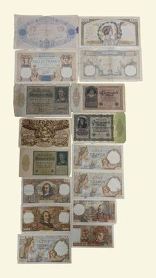 many different types of paper money on the table