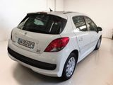 a white car that is parked in a garage