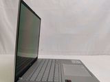 a laptop that is sitting on a white surface