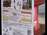 a box that has a doll in it on it