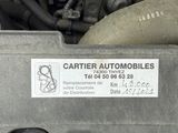 an image of a car engine with a sticker on it